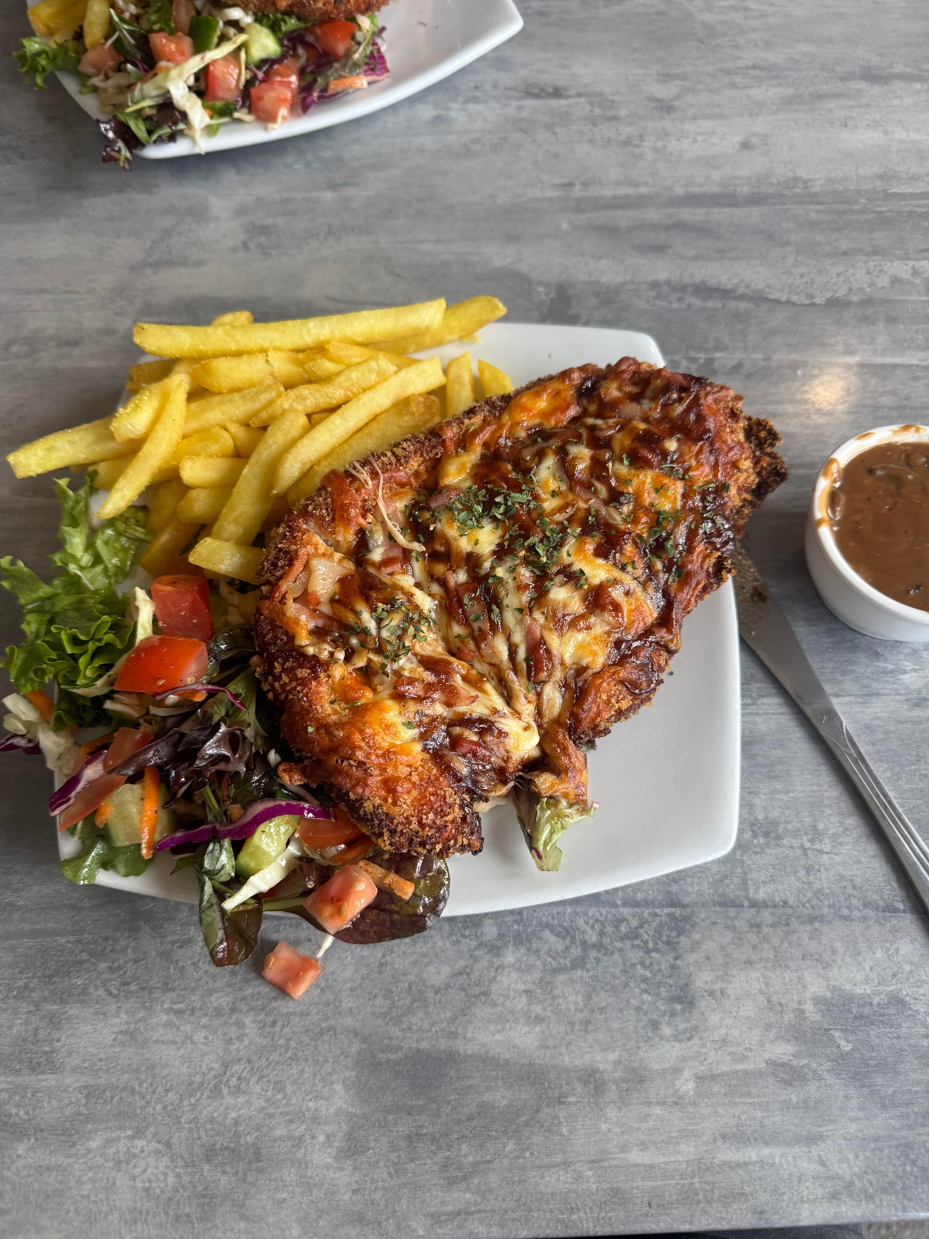 Chicken parmi from Top Town Tavern